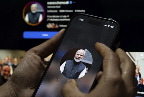 In this photo illustration, a close view of a smartphone displaying the profile picture of Indian Prime Minister Narendra Modi on Instagram as a user navigates the account, in Guwahati, India on 26 February 2026. PM Narendra Modi has crossed 100 million followers on Instagram, marking a major social media milestone and highlighting his strong digital reach and global online influence