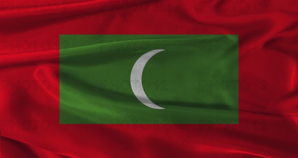 Flag of Maldives with fabric textured background. Close up of National flag of Maldives with realistic texture