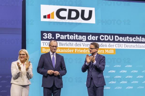 38th Federal Party Conference of the CDU in Stuttgart. Long applause for Federal Chancellor Friedrich Merz after his speech to the delegates. Congratulations from Carsten Linnemann (Member of the Bundestag, Secretary General), Christina Stumpp (Member of the Bundestag, Deputy Secretary General. Stuttgart, Baden-Württemberg, Germany