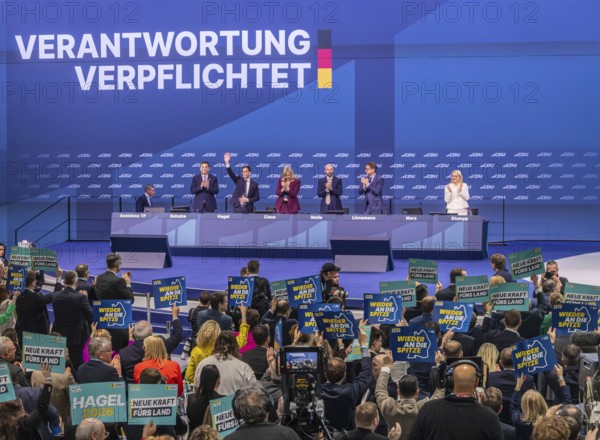 38th Federal Party Conference of the CDU in Stuttgart. Applause for Manuel Hagel after his speech. Congratulations from the Federal Chancellor. Manuel Hagel (MdL, state chairman of the CDU BW, parliamentary group leader in the state parliament of BW, top candidate for the state election in BW 2026. Conference presidium. Stuttgart, Baden-Württemberg, Germany