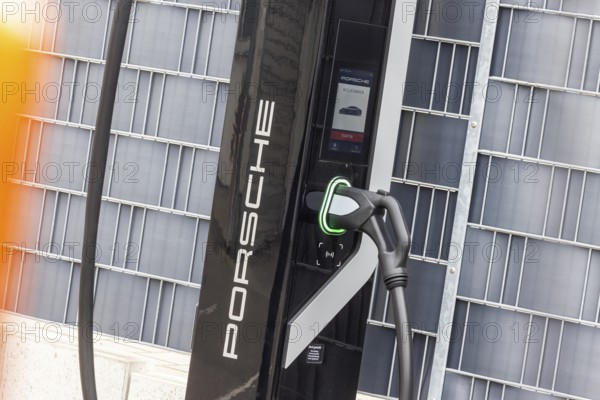 Electric charging station on the Porsche inn Zuffenhausen factory premises. Stuttgart, Baden-Württemberg, Germany