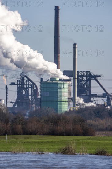 Backdrop of the HKM steelworks, Krupp-Mannesmann steel mill, blast furnaces, gasometer, coking plant extinguishing tower, fire cloud, North Rhine-Westphalia, Duisburg, Germany