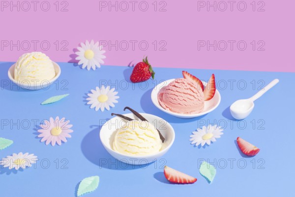 Vibrant split background in pink and blue showcasing various ice cream flavors. The scene includes decorative elements such as flowers and fruit slices arranged aesthetically