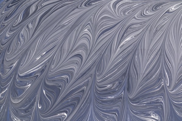 A captivating abstract design in grey and white, featuring elegant swirling patterns. This fluid texture resembles marble, adding a sophisticated touch to any project