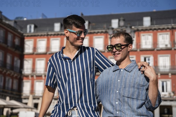 A joyful gay couple walking through the vibrant streets of Madrid, showcasing love and diversity in a sunny urban setting, symbolizing pride and acceptance