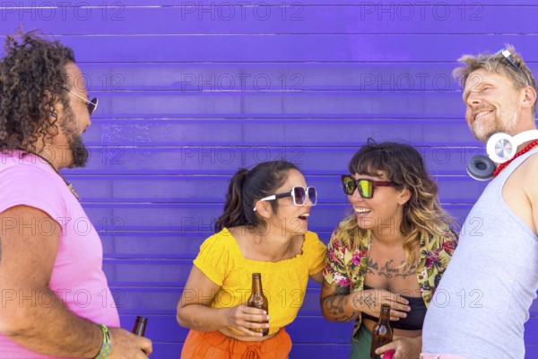 A joyful group of LGBTQIA+ friends gathers, sharing laughter and embracing diversity, symbolizing pride and unity against a vibrant purple background