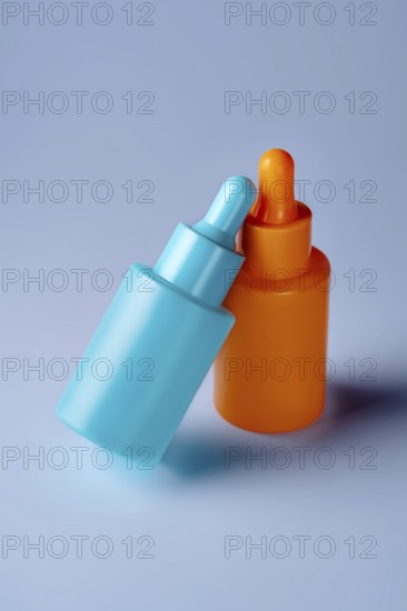 Two vibrant serum bottles in blue and orange hues are showcased against a soothing blue background, emphasizing modern aesthetic and simplicity