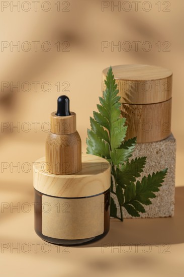 A cosmetic bottle with a natural wood accent, displayed on a beige background. The setting is enhanced by a green leaf, offering an eco-friendly and minimalist vibe