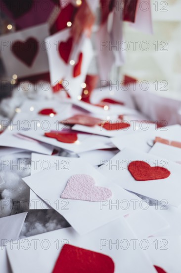 A romantic scene with Valentine's Day letters adorned with felt hearts. Soft lighting highlights the warmth and love in this heartfelt display, capturing the essence of affection
