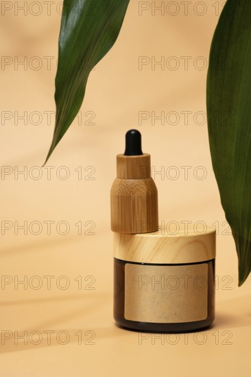 A cosmetic bottle with a wooden cap on a warm beige background, accented by green leaves. The aesthetic blends nature and elegance, perfect for organic beauty products