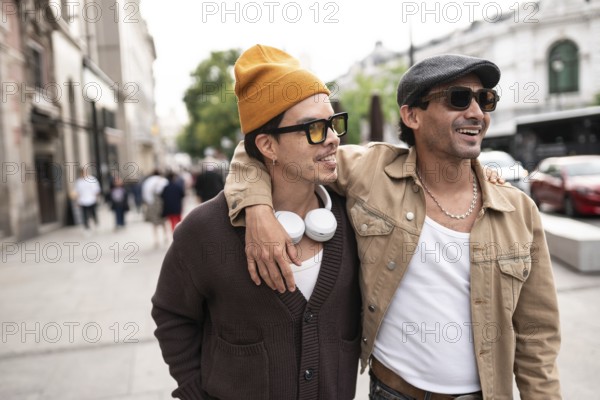 A joyful colombian gay couple enjoying a casual city walk. Both are wearing sunglasses and showcasing happiness and connection against an urban backdrop of architecture and vehicles