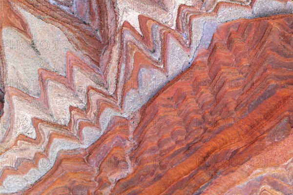 Captivating aerial image of the textured and winding canyons near the San Juan river in Utah, showcasing vivid geological formations
