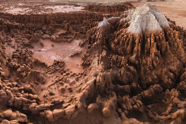Captivating view of the intricate and unusual rock formations at Goblin Valley State Park, showcasing the textured landscape's reddish hues in Utah, USA