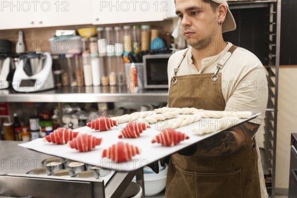 A skilled baker in a cozy Italian bakery prepares fresh pastries and bread The warm atmosphere highlights careful attention to detail and traditional baking techniques