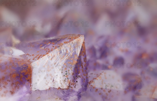 Extreme macro photograph of an amethyst crystal, from the Purple Haze mine near Thunder Bay, Ontario, Canada The red coloration is due to the presence of hematite inclusions
