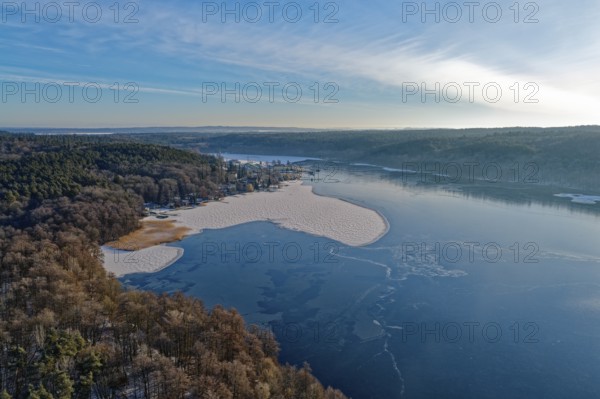 Lake Werbellin in the UNESCO Schorfheide-Chorin Biosphere Reserve with ice rinks in winter. aerial view. Joachimsthal, Schorfheide, Brandenburg, Germany