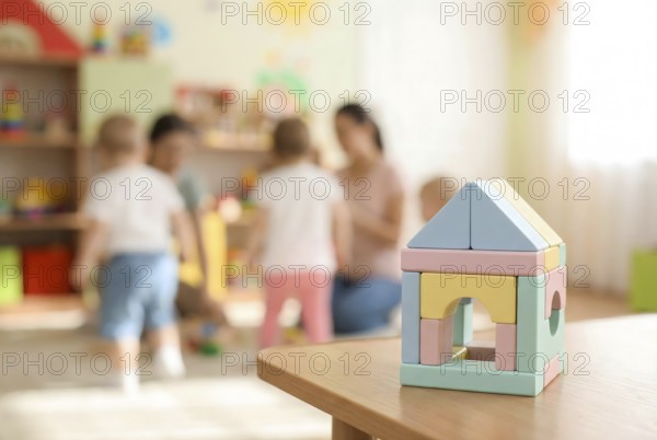 Pastel wooden building bricks toys and blurry playing children in background in children day care center, kindergarten or preschool. Generative AI, AI generated