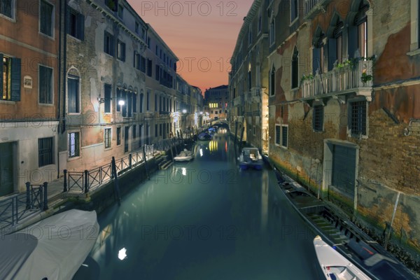 Nighttime atmosphere on the canal in the Dorsoduro district, Venice, Veneto, Italy