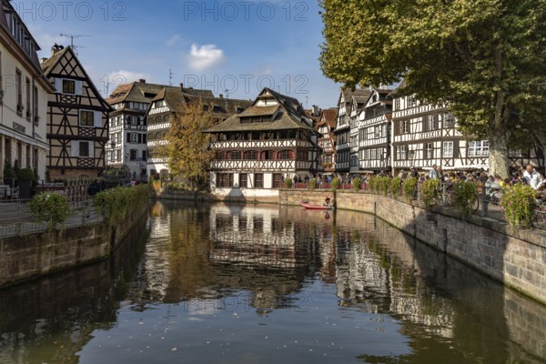 Half-timbered houses and the Maison des Tanneurs on the Ill River in Petite France, Strasbourg, Alsace, France