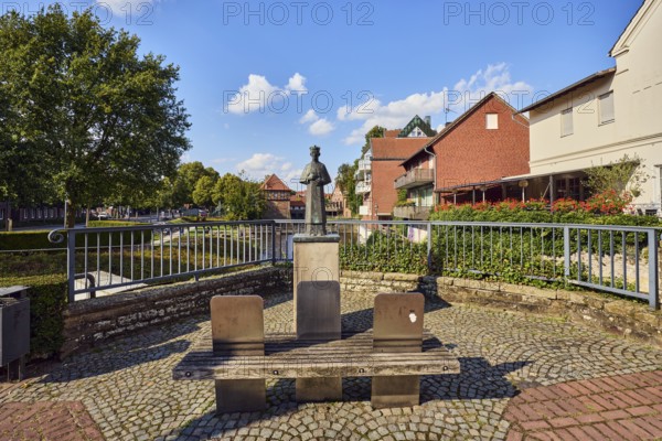 Saint Johannes Nepomuk bridge saint, general architecture, houses, brick buildings, residential buildings, Mühlenstever, Stever river, metal railing, pedestrian bridge, pedestrian zone, bench, paving stone walkway, trees, blue sky, cumulus clouds, Mühlenstraße, Borgmühlenpättken, Lüdinghausen, Münsterland, Coesfeld district, North Rhine-Westphalia, Germany