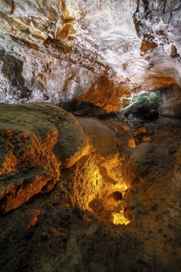 Underground cave formed by lava flow, illuminated lava tunnel, Cueva de los Verdes, Lanzarote, Canary Islands, Spain