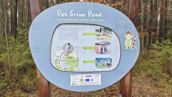 Information sign about the Green Belt in a wooded area, hiking on the former inner-German border on the Green Belt near Mitwitz, Frankenwald nature park Park