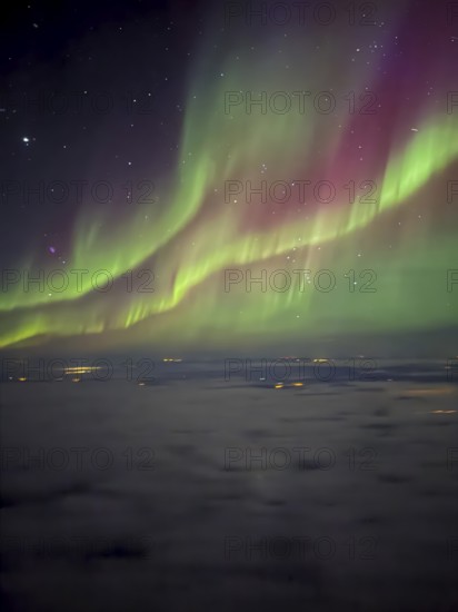 Northern lights, aurora borealis, aerial view from an airplane, Finland