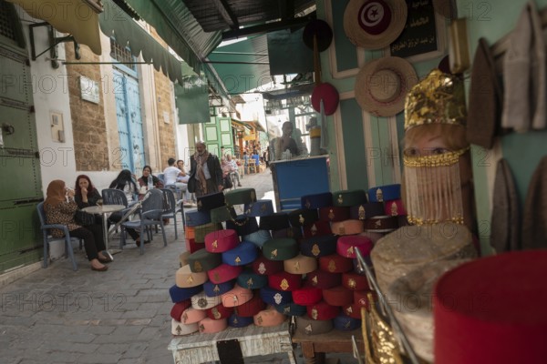 Colourful Tunisian Chechia, traditional soft wool hats popular in the Maghreb region of North Africa for sale in Souk Ech-Chaouachine, the Medina of Tunis, Tunisia