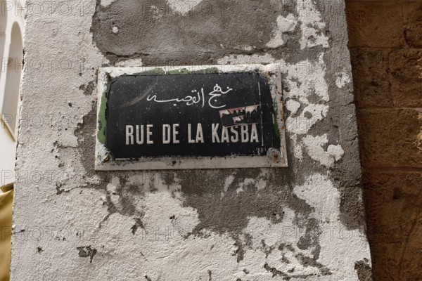 Tunis, Tunisia. 13th May 2024 A Tunisian street sign for Rue de la Kasba, written in French and Arabic in the main thoroughfare in Tunis Medina, a world heritage site in Tunisia, North Africa