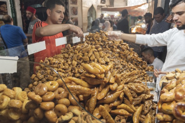 Tunis, Tunisia. 15th May 2024 Traditional Tunisian sweets for sale in the busy market of Tunis Medina, the historical Kasbah is a World Heritage Site and popular tourist destination in Tunisia