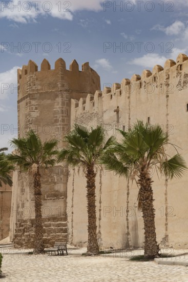Tower and detail of the ancient city walls of the medieval Medina of Sfax on the Mediterranean coast of Tunisia, North Africa