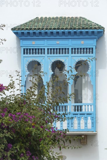 May 17th 2024. Sidi Bou Said, Tunisia. Window design detail of blue and white architecture part of a beautiful villa overlooking the Gulf of Tunis in the village of Sidi Bou Said, Tunisia