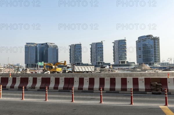 Dubai, United Arab Emirates. June 28th 2019. Highway construction work and modern apartment buildings being built in Dubai, United Arab Emirates, Middle East