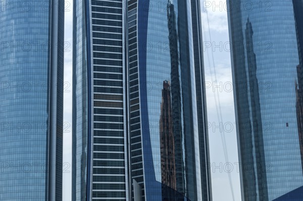Abu Dhabi, United Arab Emirates. June 23rd 2019 Abstract close-up architectural detail of modern glass fronted office and business property Etihad Towers, Corniche Road Abu Dhabi, United Arab Emirates