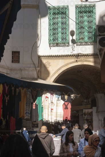 Tunis, Tunisia. 7th May 2024 A busy street in the Medina popular with Tunisians shopping, the medina is the historical quarter of Tunis, a busy market as well as a place of historical importance and world heritage site