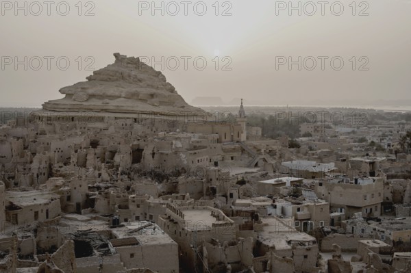 View of the mud brick houses inside the ancient fortress of Shali in Siwa Oasis, The Siwa Oasis, an urban oasis in Egypt situated between the Qattara Depression and the Great Sand Sea in the Western Desert