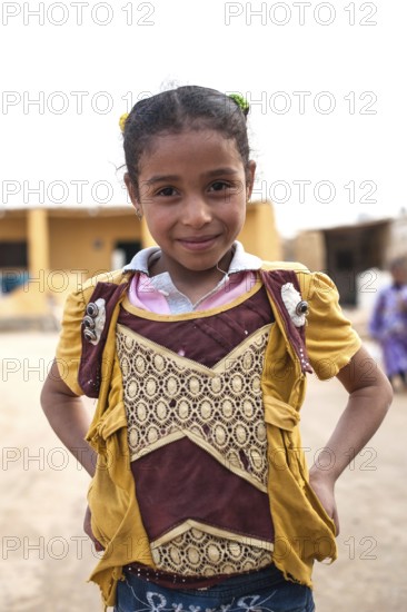 Siwa, Egypt. March 11th 2018 Portrait of a pretty young girl in a village near Siwa Oases. The Siwa Oasis, an urban oasis in Egypt situated between the Qattara Depression and the Great Sand Sea in the Western Desert