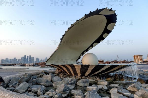 Doha, Qatar. September 20th 2019 The Doha Pearl Monument and Fountain, a popular spot for photos, at the entrance to the Dhow Harbour on the Corniche, Qatar