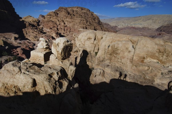 Petra, Jordan. December 11th 2012 Shadows on the Snakes Head Monument, Petra hiking trail, Jordan