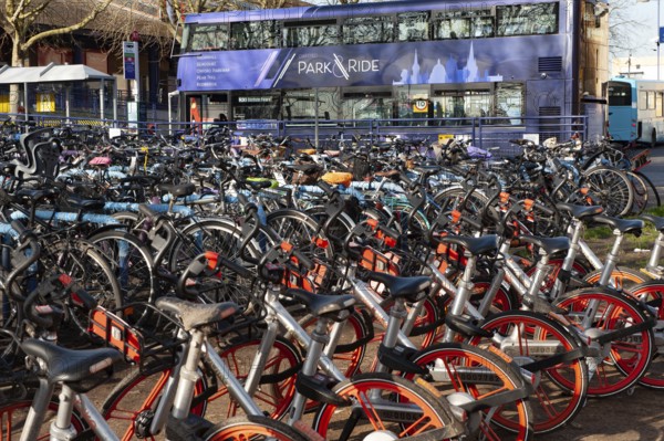 Oxford, England, UK. February 6th 2020 Bicycles parked outside the Park and Ride bus stop at Oxford City Railway Station