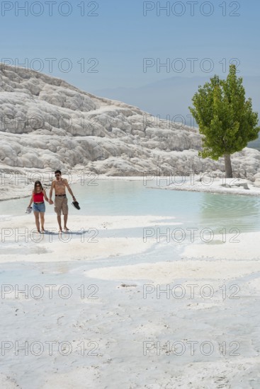 Pamakkule, Turkey, April 25th 2020 Tourists enter Travertine Terraces of Pamukkale the mineral rich thermal water has natural health giving properties, Turkey
