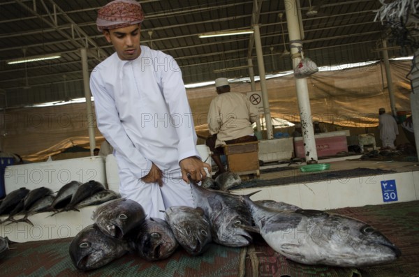 Muscat, Oman. May 26th 2014 Buying and selling inside Muscat Fish Market, Oman
