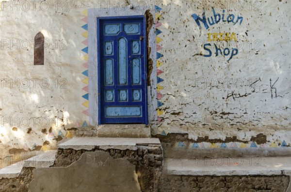 Aswan, Egypt. 8th January 2013 A bright blue painted door to local Nubian Shop, Elephantine Island on the west bank of the River Nile, Aswan, Egypt