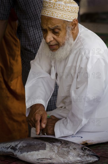Muscat, Oman. May 26th 2014 Buying and selling inside Muscat Fish Market, Oman