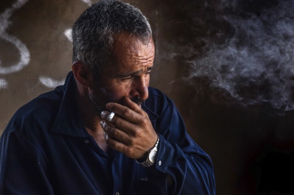 Tyre, Lebanon. July 16th 2010 A Lebanese farmer smoking in his village home, southern Lebanon