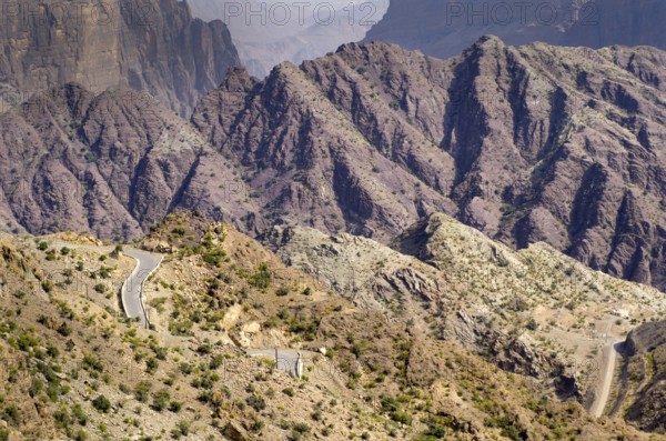 Dramatic Omani mountains called Jebel Akhdar of the Hajar mountain range, the harsh interior of Oman, home of traditional rose harvesting and fruit farming