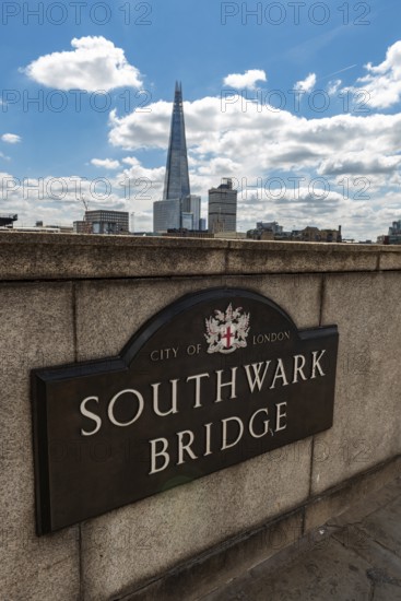London, United Kingdom. July 9th 2022 Sign for the Grade II listed historical Southwark Bridge over the River Thames in central London close to the Tate Modern Art Gallery. UK