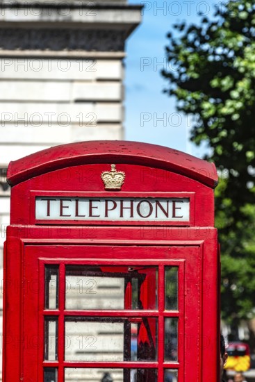 Traditional British Red Telephone Box in central London, England, United Kingdom