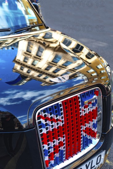 London, United Kingdom. June 26th 2022 British Union Jack flag painted onto the grill of a traditional London Black Cab, United Kingdom