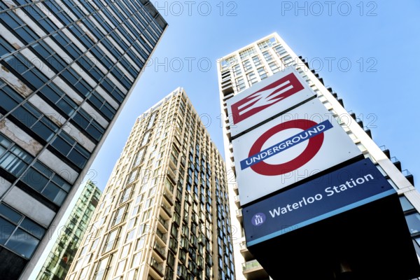 London, United Kingdom. October 10th 2023 Sign for London Waterloo Station, a busy commuter station with high rise office buildings on the south bank of the Thames, part of the National Rail network in the United Kingdom